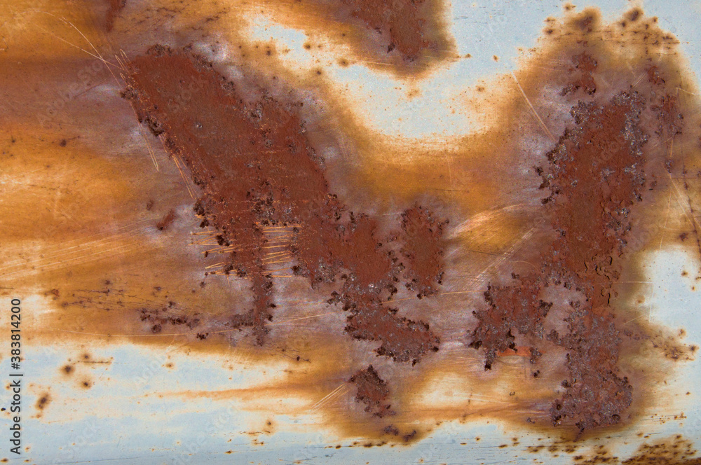 Fototapeta premium Texture of old blue rusty painted metal wall with smudges and stains close up