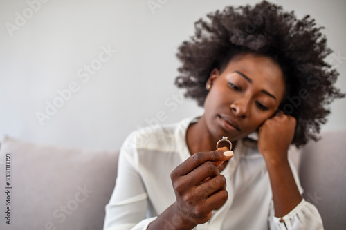 Canvas Print Close up of decisive woman take off wedding ring make decision breaking up with