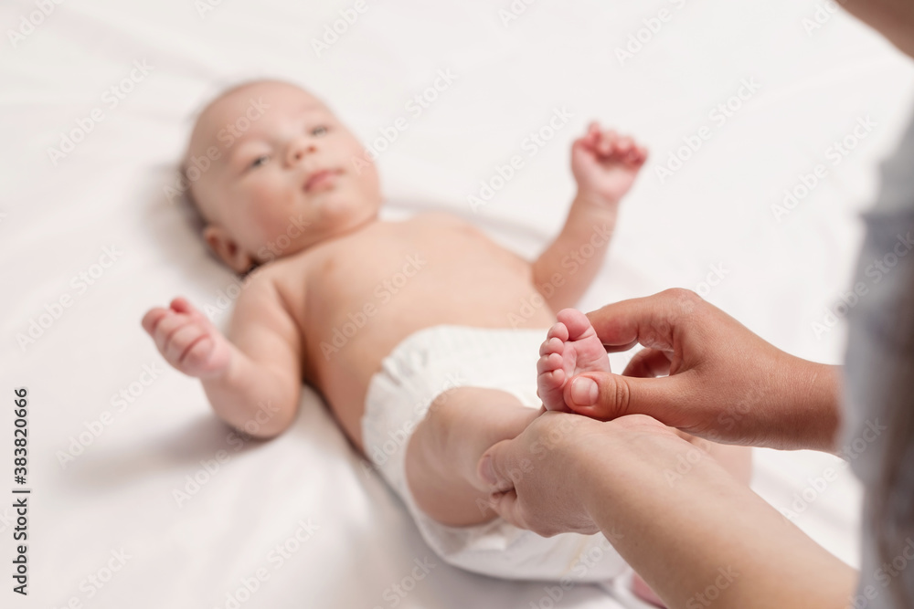 baby foot massage, close-up of hands and foot of baby baby foot massage, close-up of hands and foot of baby