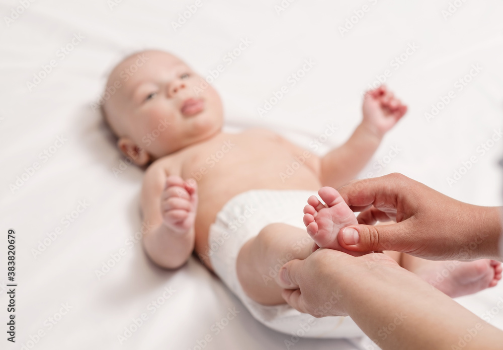 baby foot massage, close-up of hands and foot of baby baby foot massage, close-up of hands and foot of baby