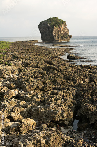 Chuanfan Rock at coastline photo