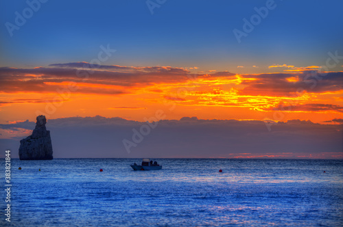 Ibiza Cala Benirras sunset beach in san Juan at Balearic photo