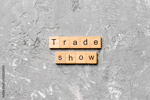Trade Show word written on wood block. Trade Show text on cement table for your desing, concept