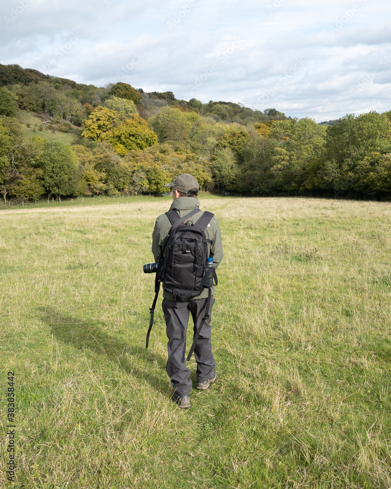Solo photographer in the woods in autumn Solo photographer in the woods in autumn