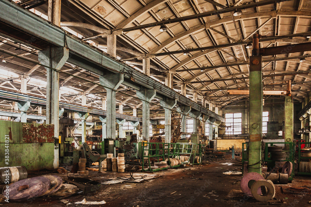 An abandoned old large industrial hall is waiting to be demolished. Former Khabarovsk plant for the production of diesel engines.