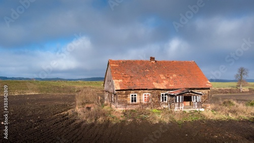 Rustic old house in the field.