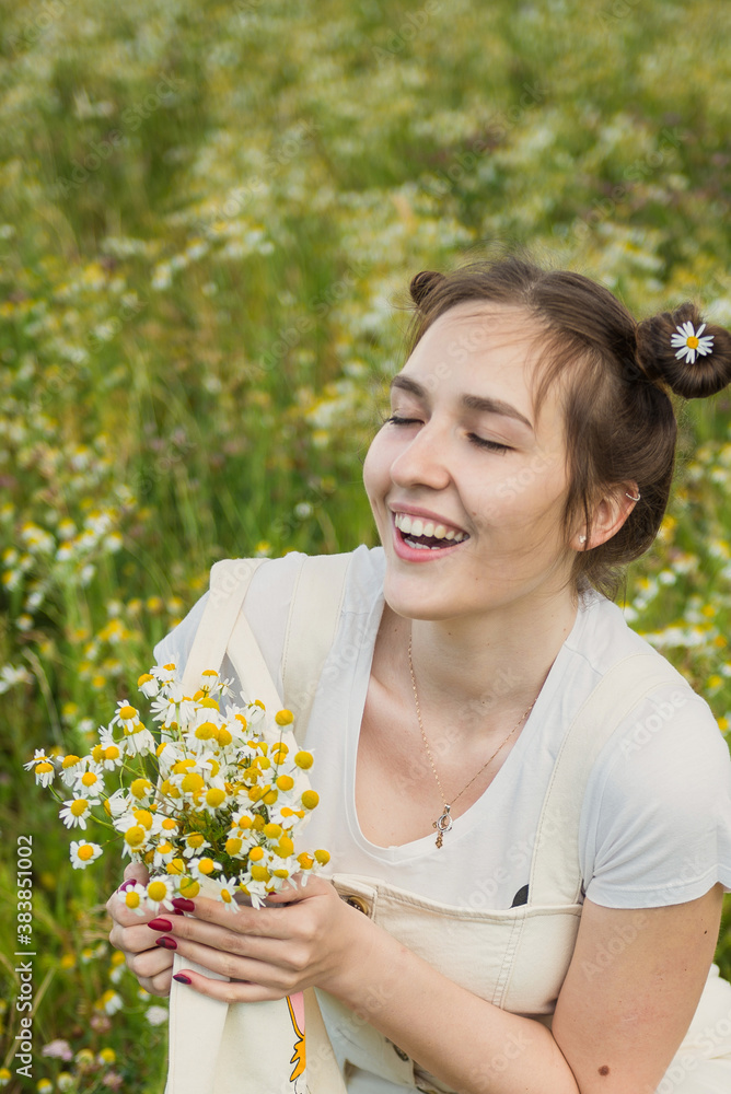 Young girl. Chamomile field. Beige jumpsuit. Young girl. Chamomile field. Beige jumpsuit.