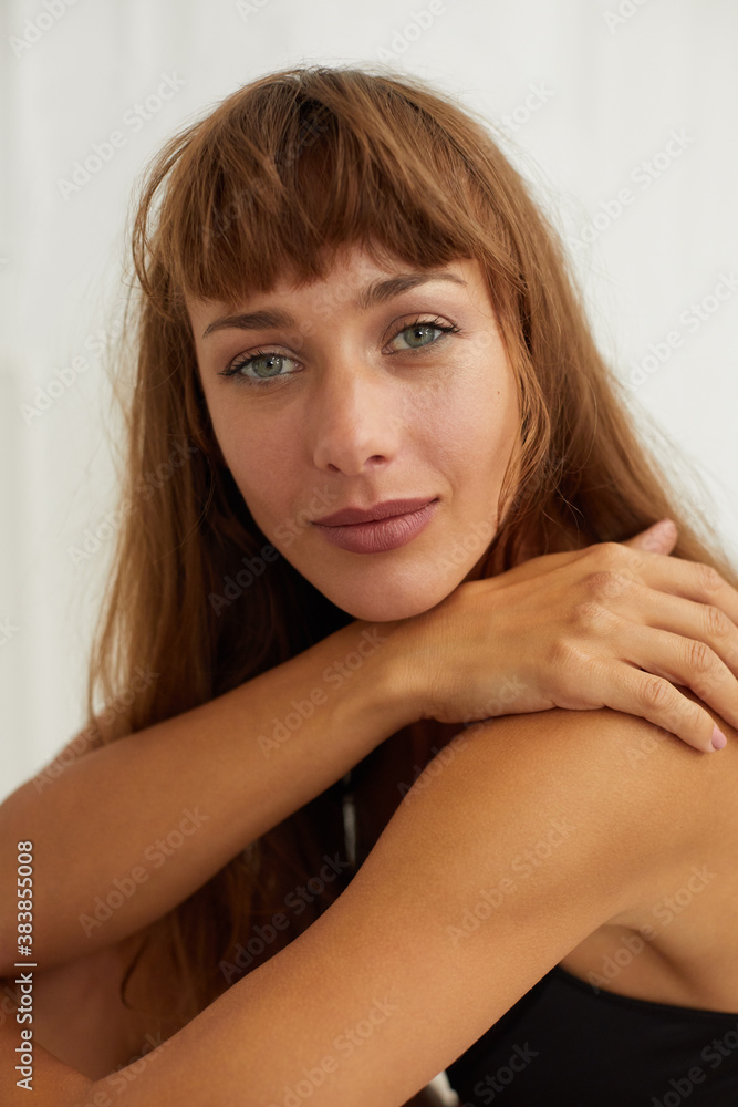 Smiling woman wearing a black bra Smiling woman wearing a black bra