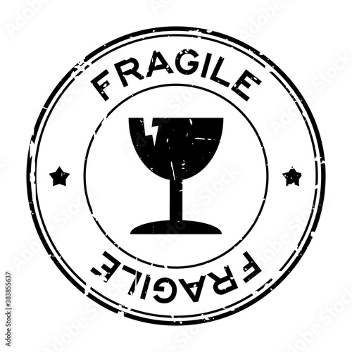 Grunge black fragile word with broken cup icon round rubber seal stamp on white background