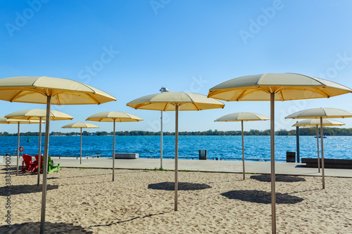 fragment of view of inviting beautiful sugar beach at lake Ontario on autumn warm sunny enjoyable day © Vit