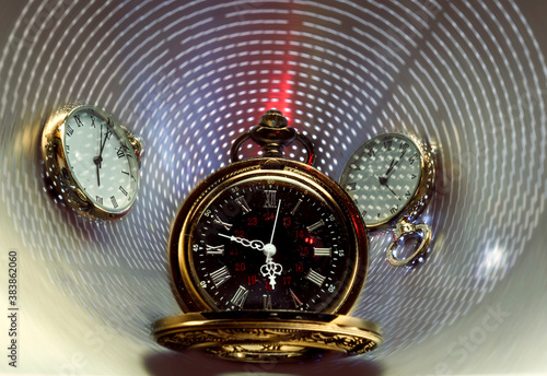 Space-time concept. Pocket watches photo