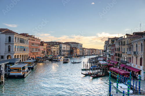 Scenic views down the Grand Canal from the Rialto Bridge as the sun sets