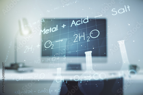 Double exposure of creative chemistry concept on laptop background, research and development concept