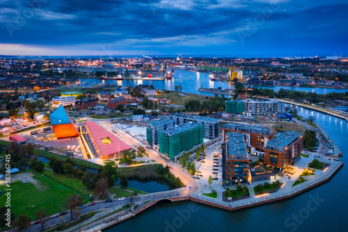 Aerial view of the Gdansk city over Motlawa river with amazing architecture at dusk, Poland