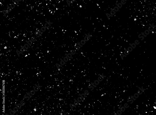Real snow on black background as texture