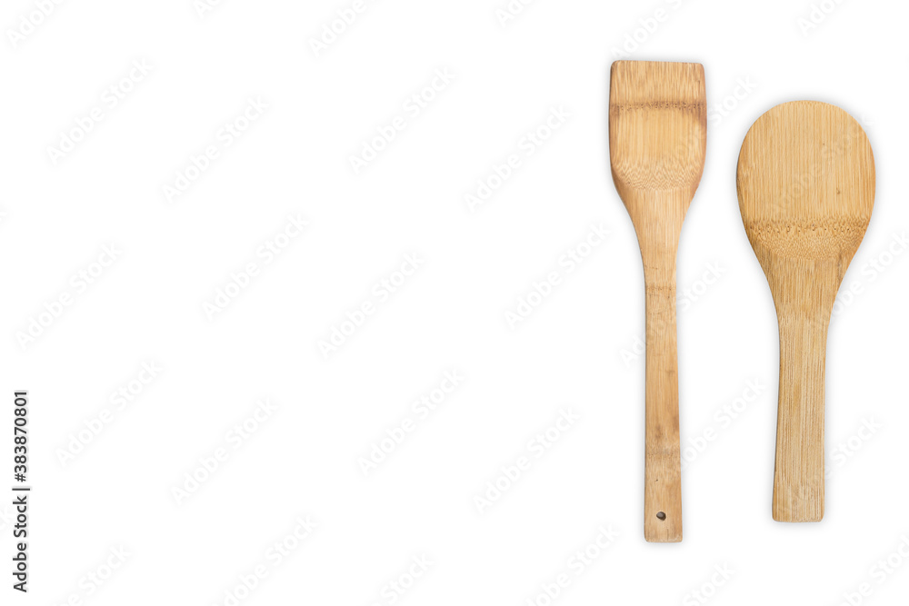 two wooden spoons isolated with white background two wooden spoons isolated with white background