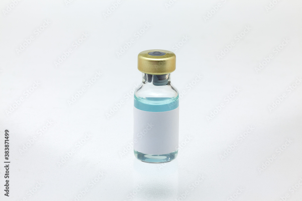 Isolated glass vaccine bottle with colored liquid very close high magnification mockup Isolated glass vaccine bottle with colored liquid very close high magnification mockup