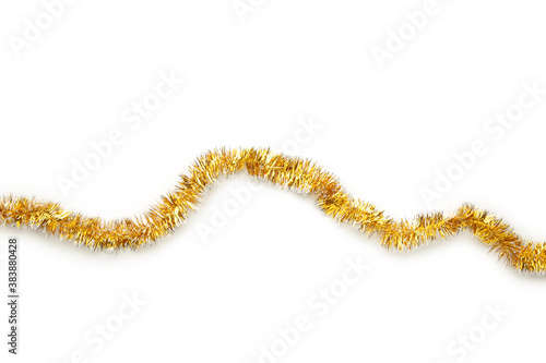 Christmas gold tinsel isolated on white background. photo