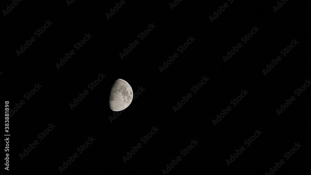 Movement of the moon in the night sky. Timelapse. Half moon Movement of the moon in the night sky. Timelapse. Half moon