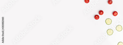 Cucumber slices and small tomatoes