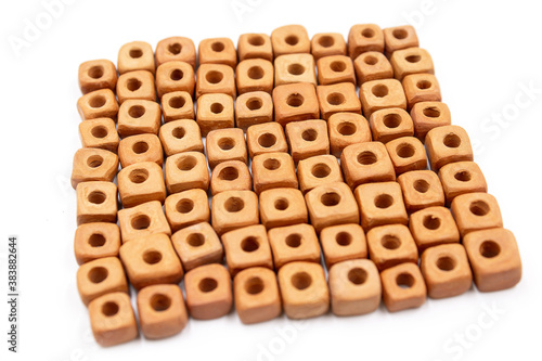 Ceramic bead made of baked clay square shape