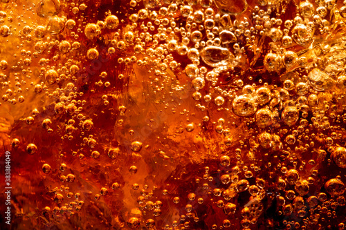 Foto Close up view of the ice cubes in cola background ,Detail of Cold Bubbly Carbona
