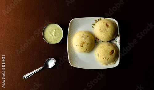 Rava idli with chutney on the table photo