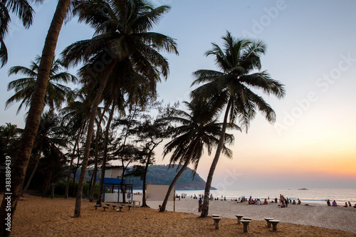 Evening on the beach of Gokarna town - amazing sunset and people - watching on it