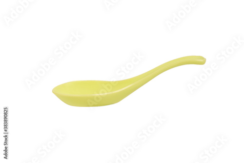 green spoon isolated on white background.