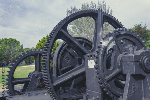 part of the machinery of a train in a park in the center of Madrid