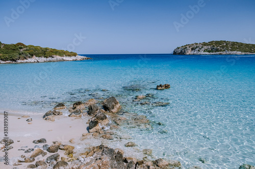Tropical beach of Voulisma beach, Istron, Crete, Greece ,Most beautiful beaches of Crete island -Istron bay near Agios Nikolaos  photo