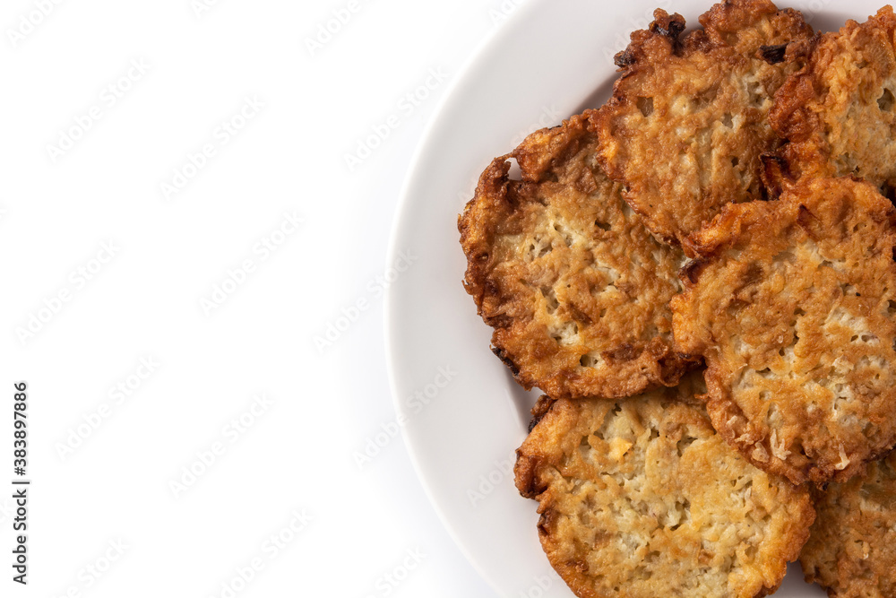 Traditional Jewish latkes or potato pancakes isolated on white background Traditional Jewish latkes or potato pancakes isolated on white background