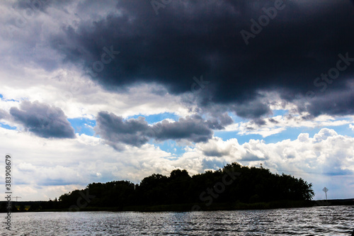 stormy sky on a lake photo