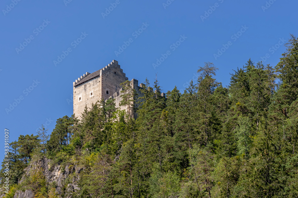 The ruins of Kronburg Castle are located on a steep rock face between Zams and Schönwies in the Tyrolean Oberland, Austria