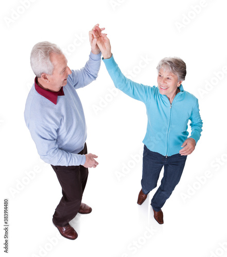 Photography Portrait Of Senior Couple Dancing