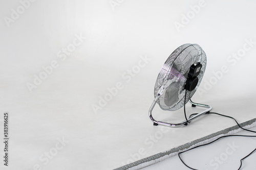 Running fan in studio on a white background.