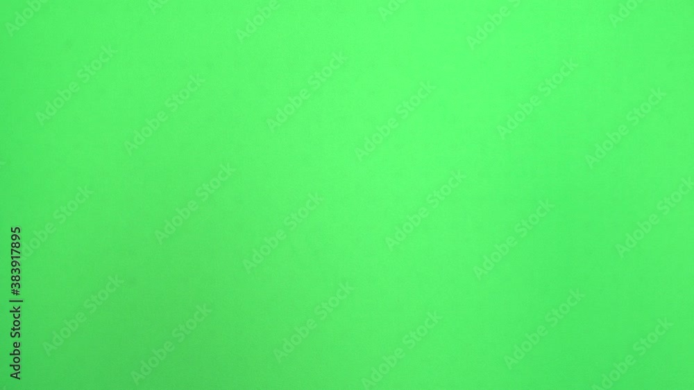 High five! Greetings from a man's hand on a green background or chromakey High five! Greetings from a man's hand on a green background or chromakey