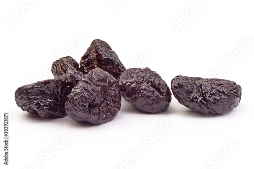 Dried plums fruits, tasty prunes, close-up, isolated on white background