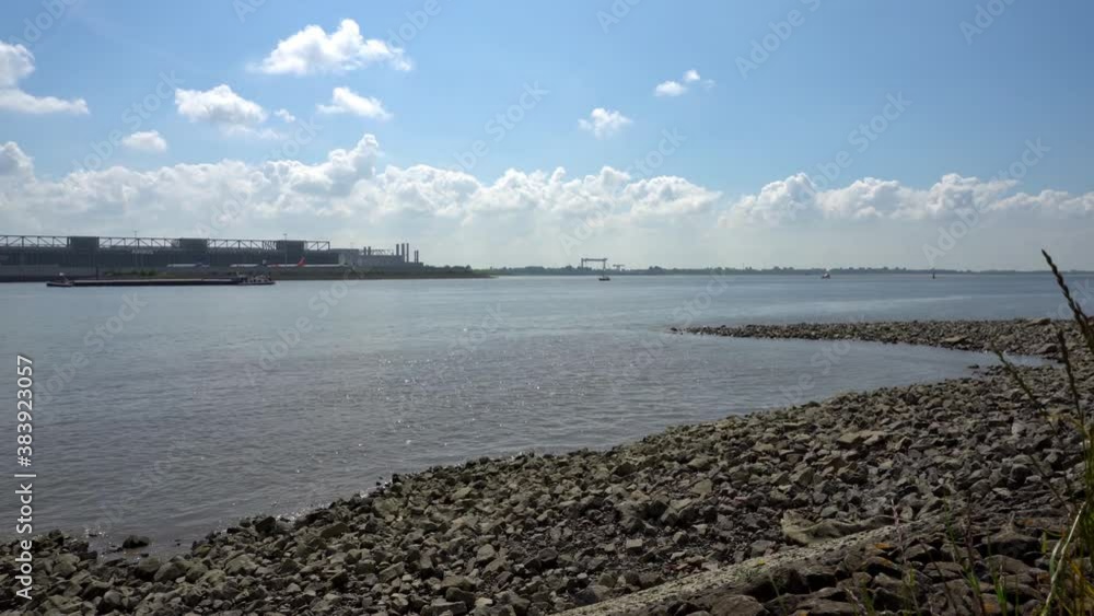 Elbe in Hamburg - Elbe Shore View with Ship Elbe in Hamburg - Elbe Shore View with Ship
