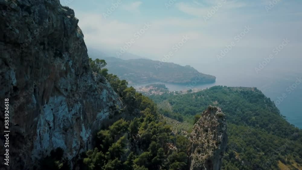 Stunning wide 4k aerial view of Port de Soller in Mallorca - Serra de Tramuntana - Balearic Islands Stunning wide 4k aerial view of Port de Soller in Mallorca - Serra de Tramuntana - Balearic Islands
