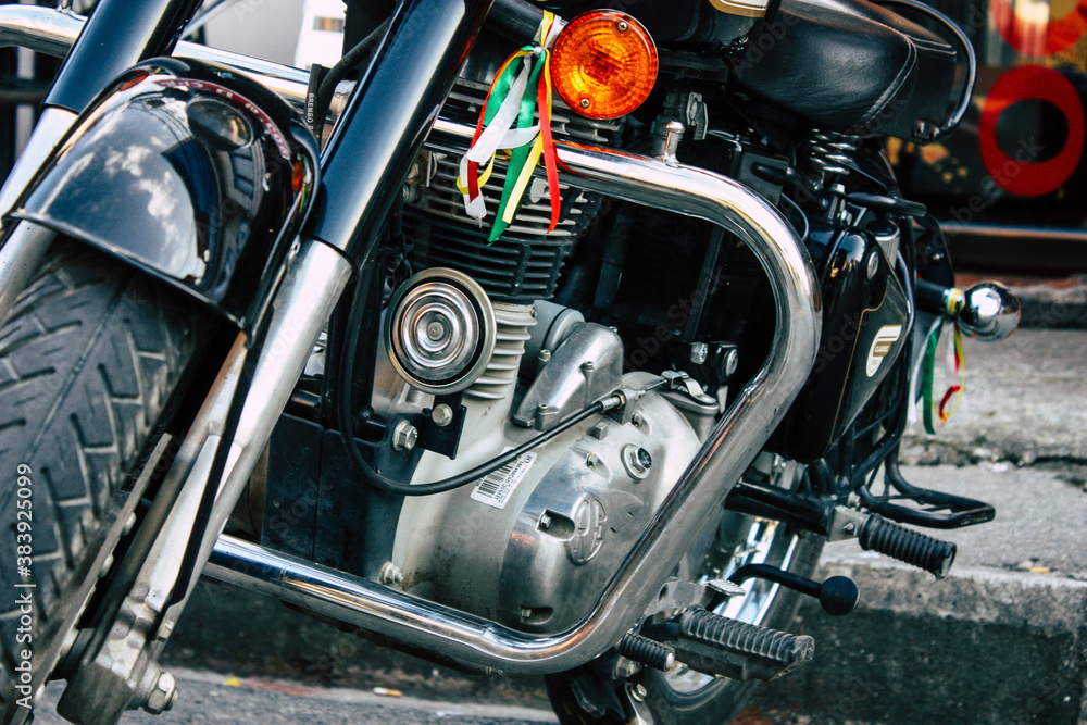 Closeup of a motorcycle parked in the streets of the city center of the metropolitan area
Closeup of a motorcycle parked in the streets of the city center of the metropolitan area