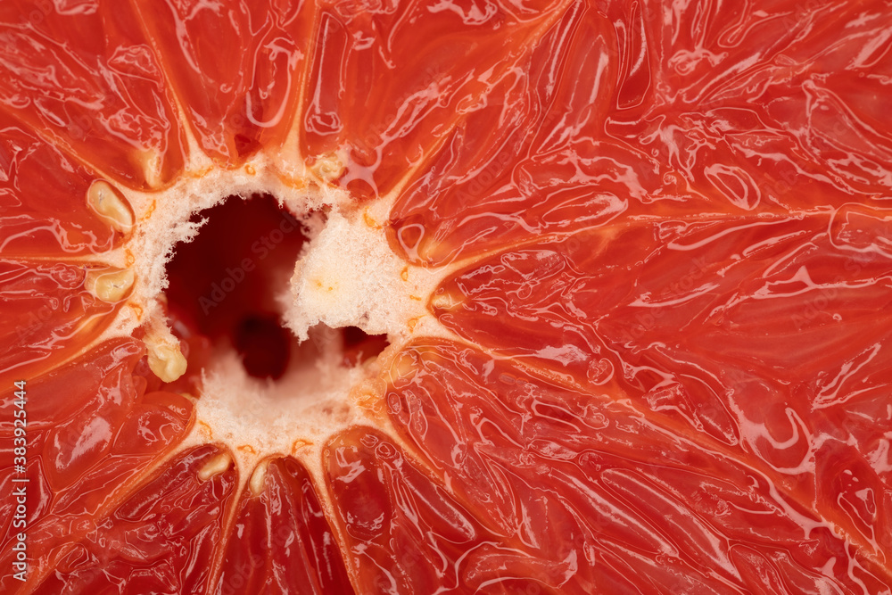 Closeup of red grapefruit. Fragrant fresh delicious slice of grapefruit. Fruit texture. Closeup of red grapefruit. Fragrant fresh delicious slice of grapefruit. Fruit texture.
