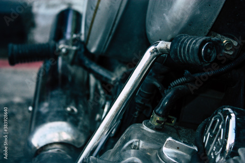 Closeup of a motorcycle parked in the streets of the city center of the metropolitan area 