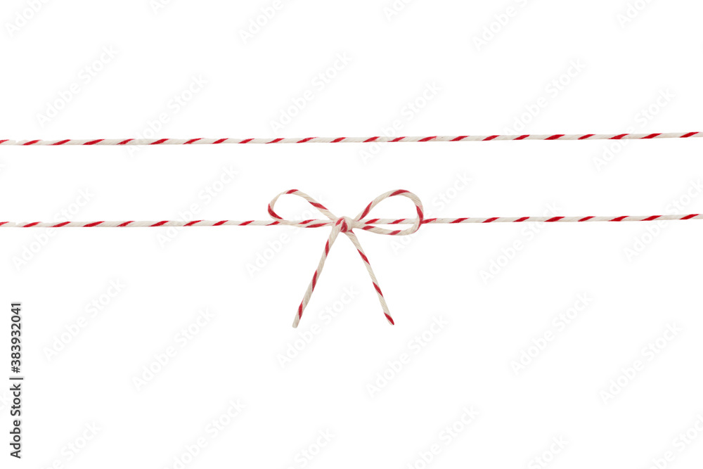Twine rope with tied bow isolated in white.Christmas decoration.Braided string for packing.Parcel wrapping tape. Twine rope with tied bow isolated in white.Christmas decoration.Braided string for packing.Parcel wrapping tape.