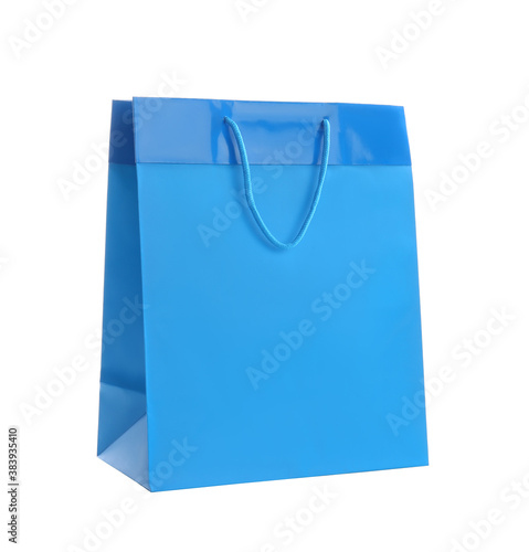 Blue paper shopping bag isolated on white