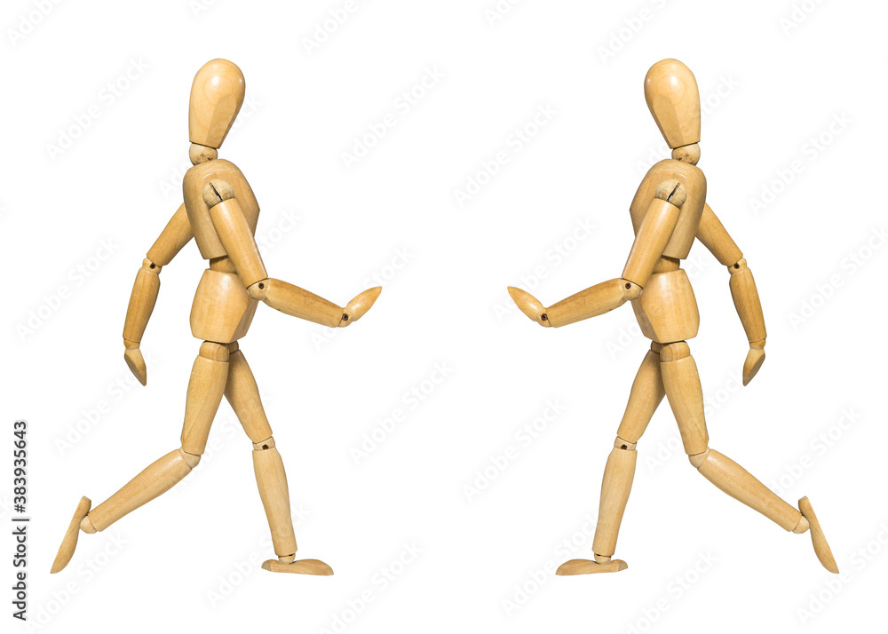 wooden figure a man doll running on white background wooden figure a man doll running on white background
