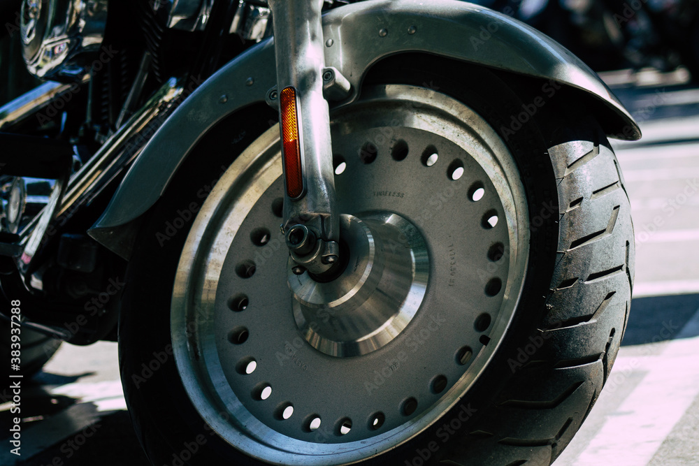 Closeup of a motorcycle parked in the streets of the city center of the metropolitan area
Closeup of a motorcycle parked in the streets of the city center of the metropolitan area