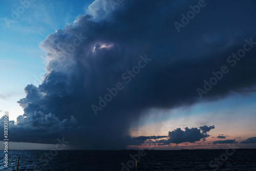 Dark clouds over the ocean during a tropical storm above caribbean see