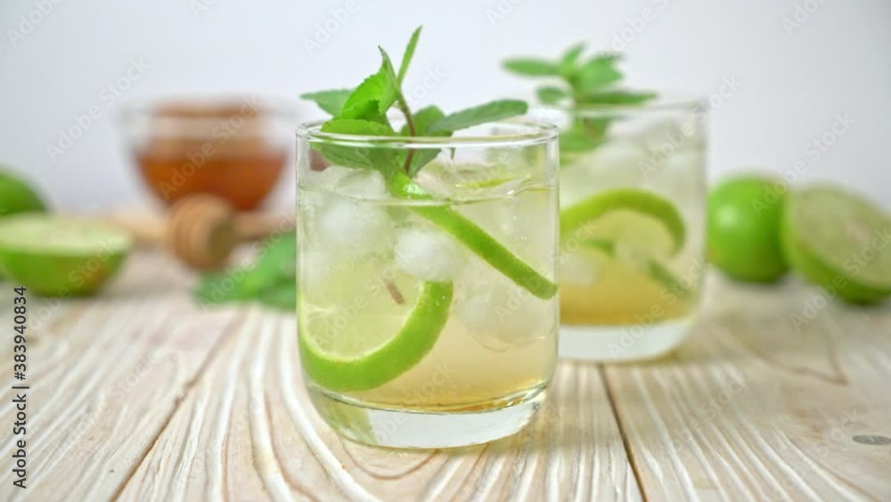 iced honey and lime soda with mint - refreshing drink iced honey and lime soda with mint - refreshing drink