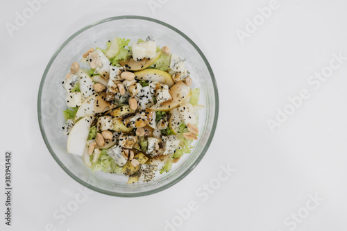 homemade healthy fresh salad with blue cheese, pears, nuts and balsamic dressing, vegetable salat photo